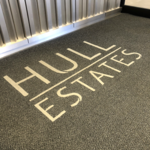 Custom logo mat at Hull Estates with Equinox matting.