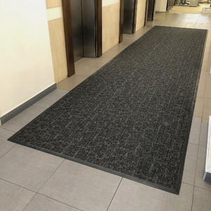 Cinza matting installed in an elevator lobby.